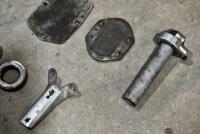 BSA: Various BSA parts including fork link, headlight mounts, fronm brake anchor screw, sump guard, engine cover plate. [Location: Sydney] - 2
