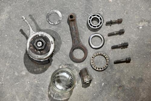 DOUGLAS: A group of miscellaneous Douglas parts including clutch mechanism, conrod, bearings, headstock bearings. [Location: Sydney]