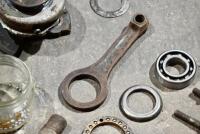 DOUGLAS: A group of miscellaneous Douglas parts including clutch mechanism, conrod, bearings, headstock bearings. [Location: Sydney] - 5