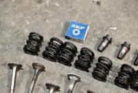 VALVES: A group of valves, valve springs&nbsp;and keepers. [Location: Sydney] - 2