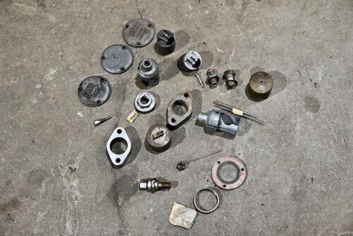 AMAL: A quantity of Amal carburettor parts. [Location: Sydney]