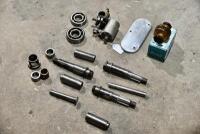 AJS: A quantity of AJS engine parts including big end pin, NOS Alpha bearing. [Location: Sydney]