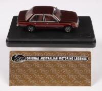 VC COMMODORE: A 1:43 scale Trax Holden VC Commodore SL/E sedan model, finished in two tone maroon & dark red paintwork, model number TR61 - 2
