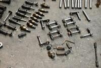 AUSTIN: A group of miscellaneous Austin Seven parts including&nbsp;idler gears, valves and steering link. [Location: Sydney] - 3