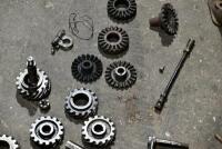 AUSTIN: A group of miscellaneous Austin Seven parts including&nbsp;idler gears, valves and steering link. [Location: Sydney] - 10