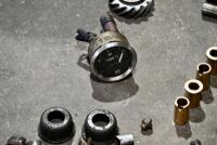 AUSTIN: A group of miscellaneous Austin Seven parts including&nbsp;idler gears, valves and steering link. [Location: Sydney] - 13
