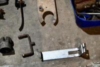 MISCELLANEOUS: A quantity of miscellaneous parts including clamps, headlight mounts, pillion rests, foot rubbers. [Location: Sydney] - 5