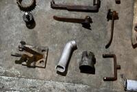 MISCELLANEOUS: A quantity of miscellaneous parts including clamps, headlight mounts, pillion rests, foot rubbers. [Location: Sydney] - 7