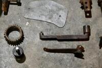 MISCELLANEOUS: A quantity of miscellaneous parts including clamps, headlight mounts, pillion rests, foot rubbers. [Location: Sydney] - 10