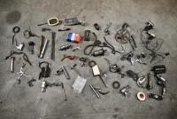 BICYCLE: Various miscellaneous bicycle parts including chains and brake levers. [Location: Sydney]
