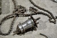 BICYCLE: Various miscellaneous bicycle parts including chains and brake levers. [Location: Sydney] - 2
