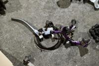 BICYCLE: Various miscellaneous bicycle parts including chains and brake levers. [Location: Sydney] - 5