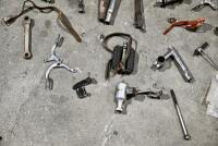 BICYCLE: Various miscellaneous bicycle parts including chains and brake levers. [Location: Sydney] - 10