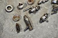 FUEL TAPS: A quantity of fuel taps and carburettor tops, unknown make or models. [Location: Sydney] - 4