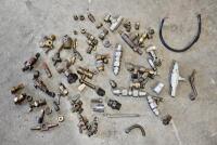 FUEL TAPS: A group of miscellaneous fuel taps and brass fittings. [Location: Sydney]