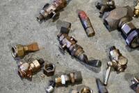 FUEL TAPS: A group of miscellaneous fuel taps and brass fittings. [Location: Sydney] - 5