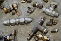 FUEL TAPS: A group of miscellaneous fuel taps and brass fittings. [Location: Sydney] - 6