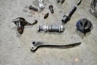 HANDLEBARS: A group of miscellaneous handlebar parts including&nbsp;levers, controls and horn button. [Location: Sydney] - 2