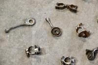 HANDLEBARS: A quantity of handlebar carburettor control parts. [Location: Sydney] - 3
