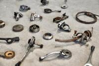HANDLEBARS: A quantity of handlebar carburettor control parts. [Location: Sydney] - 6
