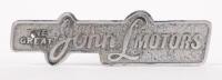 JOHN L. MOTORS: A chrome 'The Great John L. Motors' badge, John L. Motors was a well known dealership based in Auburn NSW, 13cm wide