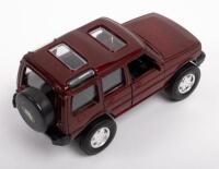 LAND ROVER: A 1:32 scale 1997 Land Rover Discovery model, colour burgundy, by Speedy Power Models, no box - 2