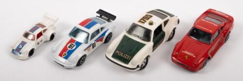 PORSCHE: A group of four small scale Porsche unboxed models