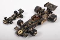 LOTUS F1: Two Lotus John Player Special Formula 1 models, unboxed, includes a 1:36 scale model, Corgi Toys Whizzwheels&nbsp;and a 1:36 scale Corgi model