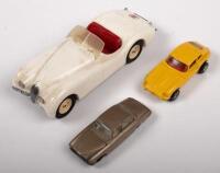 JAGUAR: A group of three, unboxed, small scale Jaguar models