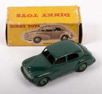 DINKY: A circa 1950s Dinky Toys, Morris Oxford saloon (#159), green with green hubs, in original box