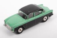 DINKY: A late 1950s, Dinky Toys Humber Hawk (#165), black on light green body, in original box - 2