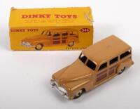 DINKY: A mid 1950s, Dinky Toys Plymouth Estate Car (#344), brown on camel body, in original box