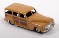 DINKY: A mid 1950s, Dinky Toys Plymouth Estate Car (#344), brown on camel body, in original box - 2