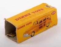 DINKY: A mid 1950s, Dinky Toys Plymouth Estate Car (#344), brown on camel body, in original box - 4