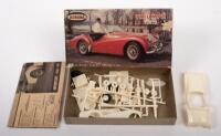 TRIUMPH: A circa 1960s Aurora Plastics Corp. 1:32 scale Triumph TR3 model kit