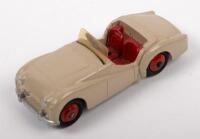 TRIUMPH TR2: A&nbsp;Dinky Toys&nbsp;Triumph TR2 model, made in England by Meccano Ltd, this model has been repainted and the chassis removed and replaced, non genuine rivets&nbsp;[UPDATED DESCRIPTION]