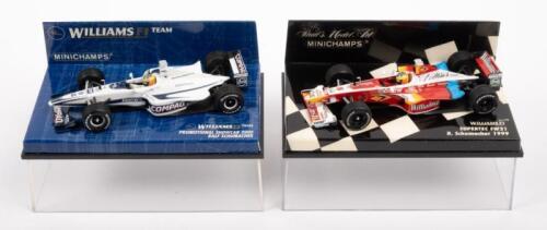 WILLIAMS F1 TEAM: Two Minichamps models including a Williams Promotional Showcar 2000 Ralf Shumacher and a Williams Supertec FW21 R. Shumacher 1999