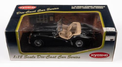 TRIUMPH TR3A: A 1:18 scale Triumph TR3A model, finished in black paintwork with a cream interior