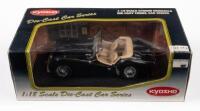 TRIUMPH TR3A:&nbsp;A 1:18&nbsp;scale Triumph TR3A&nbsp;model, finished in black&nbsp;paintwork with a cream interior