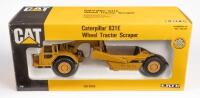 CATERPILLAR TRACTOR: A 1:50 scale Caterpillar 631E wheel tractor scraper model, finished in yellow CAT livery