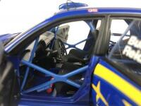SUBARU: Three 1:18 scale Subaru Impreza rally cars produced by AutoArt (NB description) - 23