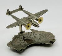 LOCKHEED LIGHTNING MODEL: Lockheed Lightning&nbsp;Fighter/Bomber Model 17cm wingspan, solid alloy on map of Australia ash-tray base [Location: Sydney]