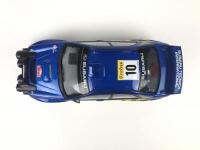 SUBARU: Three 1:18 scale Subaru Impreza rally cars produced by AutoArt (NB description) - 32