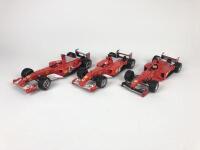 FERRARI: Three 1:18 scale Ferrari Formula 1 racing cars produced by Hotwheels (NB description)