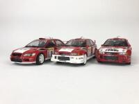 MITSUBISHI: Three 1:18 scale Mitsubishi Lancer rally cars produced by AutoArt (NB description)