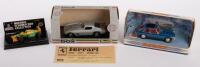 MODEL CARS: A collection of three model cars featuring a Revell scale 1:43, 1956-57 Ferrari 250GT in box, a Dinky 1965 MGB GT in damaged box and also a Micro Champs Benetton Ford B193, part of the Michael Schumacher Collection Edition 64, number 12 in box