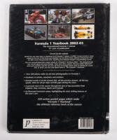 FORMULA 1: 'Formula 1 Yearbook 2002-03', hardcover book, cover signed by Michael Schumacher, Kimi&nbsp;Raikkonen and Jacques Villeneuve, 221 pages - 3