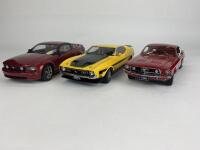 FORD: Three 1:18 scale Ford Mustang model cars produced by AutoArt (NB description)