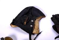 HELMET, GLOVES & GOGGLES: A leather ensemble consisting of a Lasicas 1942 helmet (size 7 1/4), pair of gloves and two sets of goggles (one boxed) from the Eric Bourn collection [Location: Sydney] - 2