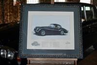 JOHN FRANCIS: Limited edition framed and glazed print (one of 250) depicting the Jaguar XK120, signed by Stirling Moss, Norman Dewis and the artist, 56cm x 74cm [Location: Sydney] - 4